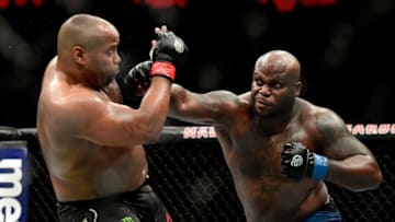 NEW YORK, NY - NOVEMBER 03: Daniel Cormier of the United States (L) fights against Derrick Lewis of the United States in their heavyweight title bout during the UFC 230 event at Madison Square Garden on November 3, 2018 in New York City. (Photo by Steven Ryan/Getty Images)