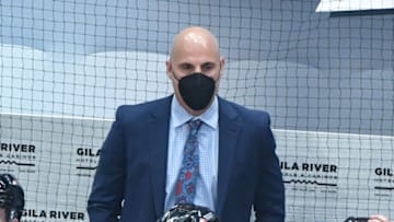 Apr 21, 2021; Glendale, Arizona, USA; Arizona Coyotes head coach Rick Tocchet looks on prior to a game against the Minnesota Wild at Gila River Arena. Mandatory Credit: Matt Kartozian-USA TODAY Sports