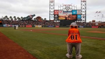 Aug 12, 2014; San Francisco, CA, USA; San Francisco Giants mascot Lou Seal observes a moment of silence for actor and Giants fan Robin Williams before the game Chicago White Sox at AT&T Park. Mandatory Credit: Kelley L Cox-USA TODAY Sports