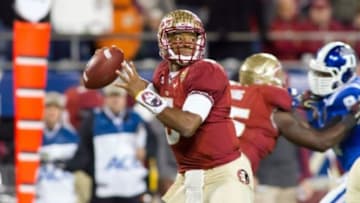 Dec 7, 2013; Charlotte, NC, USA; Florida State Seminoles quarterback Jameis Winston (5) throws a pass during the second quarter against the Duke Blue Devils at Bank of America Stadium. Mandatory Credit: Jeremy Brevard-USA TODAY Sports