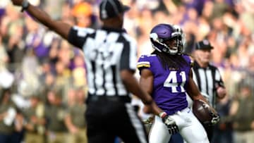 MINNEAPOLIS, MN - NOVEMBER 19: An official signals a Minnesota Vikings first down after Anthony Harris