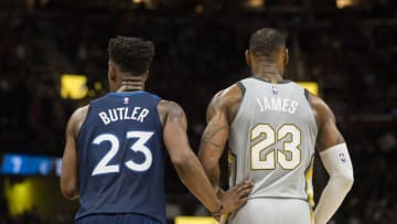 CLEVELAND, OH - FEBRUARY 7: Jimmy Butler #23 of the Minnesota Timberwolves and LeBron James #23 of the Cleveland Cavaliers wait for a play during overtime at Quicken Loans Arena on February 7, 2018 in Cleveland, Ohio. The Cavaliers defeated the Timberwolves 140-138 in overtime. NOTE TO USER: User expressly acknowledges and agrees that, by downloading and or using this photograph, User is consenting to the terms and conditions of the Getty Images License Agreement. (Photo by Jason Miller/Getty Images)