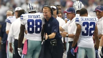 Oct 5, 2014; Arlington, TX, USA; Dallas Cowboys receiver Dez Bryant (88) celebrates with head coach Jason garrett after scoring a touchdown in the fourth quarter against the Houston Texans at AT&T Stadium. The Cowboys beat the Texans 20-17 in overtime. Mandatory Credit: Matthew Emmons-USA TODAY Sports