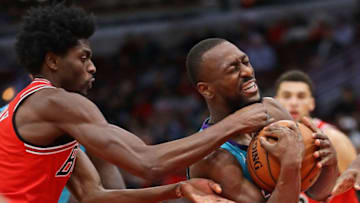 CHICAGO, IL - OCTOBER 24: Justin Holiday #7 of the Chicago Bulls tries to grab the ball away from Kemba Walker #15 of the Charlotte Hornets at the United Center on October 24, 2018 in Chicago, Illinois. The Bulls defeated the Hornets 112-110. NOTE TO USER: User expressly acknowledges and agrees that, by downloading and/or using this photograph, User is consenting to the terms and conditions of the Getty Images License Agreement. (Photo by Jonathan Daniel/Getty Images)