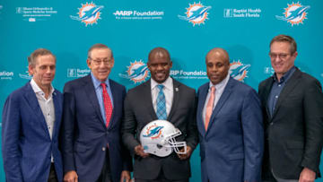 DAVIE, FL - FEBRUARY 04: (L-R) Bruce Beal Vice Chairman, Stephen Ross Chairman & Owner, Brian Flores Head Coach, Chris Grier General Manager, and Tom Garfinkel Vice Chairman and CEO of the Miami Dolphins, pose as the Miami Dolphins announce Brian Flores as their new Head Coach at Baptist Health Training Facility at Nova Southern University on February 4, 2019 in Davie, Florida. (Photo by Mark Brown/Getty Images)