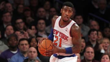 Jan 9, 2014; New York, NY, USA; New York Knicks shooting guard Iman Shumpert (21) controls the ball against the Miami Heat during the third quarter of a game at Madison Square Garden. Mandatory Credit: Brad Penner-USA TODAY Sports