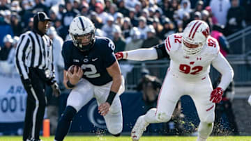 UNIVERSITY PARK, PA - NOVEMBER 10: Penn State Nittany Lions Quarterback Tommy Stevens (2) runs with the ball with Wisconsin Badgers Defensive End Matt Henningsen (92) defending during the first quarter of the Wisconsin Badgers versus the Penn State Nittany Lions game on November 10, 2018, at Carrier Dome in University Park, PA. (Photo by Gregory Fisher/Icon Sportswire via Getty Images)