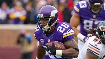 Dec 20, 2015; Minneapolis, MN, USA; Minnesota Vikings running back Adrian Peterson (28) runs in the second quarter against the Chicago Bears at TCF Bank Stadium. Mandatory Credit: Brad Rempel-USA TODAY Sports