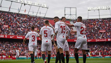 SEVILLE, SPAIN - MARCH 01: Youseff En-Nesyri of Sevilla FC celebrates scoring his team's opening goal with team mates during the Liga match between Sevilla FC and CA Osasuna at Estadio Ramon Sanchez Pizjuan on March 01, 2020 in Seville, Spain. (Photo by Fran Santiago/Getty Images)