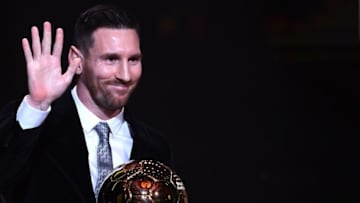Barcelona's Argentinian forward Lionel Messi reacts after winning the Ballon d'Or France Football 2019 trophy at the Chatelet Theatre in Paris on December 2, 2019. - Lionel Messi won a record-breaking sixth Ballon d'Or on Monday after another sublime year for the Argentinian, whose familiar brilliance remained undimmed even through difficult times for club and country. (Photo by FRANCK FIFE / AFP) (Photo by FRANCK FIFE/AFP via Getty Images)
