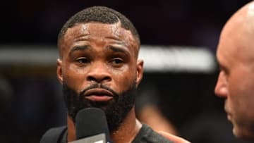 DALLAS, TX - SEPTEMBER 08: UFC welterweight champion Tyron Woodley is interviewed by Joe Rogan after defeating Darren Till of England in their UFC welterweight championship fight during the UFC 228 event at American Airlines Center on September 8, 2018 in Dallas, Texas. (Photo by Josh Hedges/Zuffa LLC/Zuffa LLC via Getty Images)