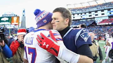 FOXBOROUGH, MA - DECEMBER 23: Josh Allen #17 of the Buffalo Bills and Tom Brady #12 of the New England Patriots meet on the field after the New England Patriots defeated the Buffalo Bills 24-12 at Gillette Stadium on December 23, 2018 in Foxborough, Massachusetts. (Photo by Maddie Meyer/Getty Images)