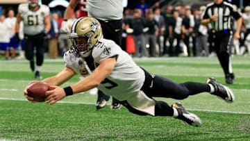 ATLANTA, GA - SEPTEMBER 23: Drew Brees #9 of the New Orleans Saints dives into the end zone for a touchdown during the fourth quarter against the Atlanta Falcons at Mercedes-Benz Stadium on September 23, 2018 in Atlanta, Georgia. (Photo by Daniel Shirey/Getty Images)
