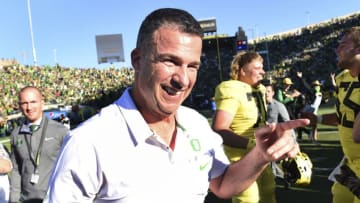 EUGENE, OR - OCTOBER 13: Head coach Mario Cristobal of the Oregon Ducks celebrates after his team won the game against the Washington Huskies at Autzen Stadium on October 13, 2018 in Eugene, Oregon. The Ducks won the game 30-27. (Photo by Steve Dykes/Getty Images)