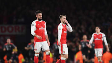 LONDON, ENGLAND - MARCH 07: Olivier Giroud and Aaron Ramsey of Arsenal look dejected during the UEFA Champions League Round of 16 second leg match between Arsenal FC and FC Bayern Muenchen at Emirates Stadium on March 7, 2017 in London, United Kingdom. (Photo by Shaun Botterill/Getty Images)