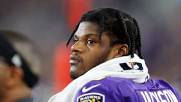 BALTIMORE, MARYLAND - JANUARY 11: Lamar Jackson #8 of the Baltimore Ravens reacts on from the sideline during the first half against the Tennessee Titans in the AFC Divisional Playoff game at M&T Bank Stadium on January 11, 2020 in Baltimore, Maryland. (Photo by Maddie Meyer/Getty Images)