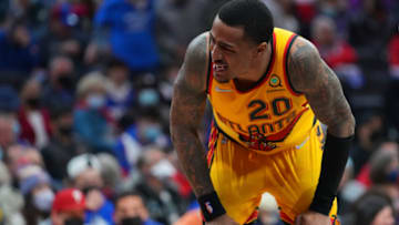 PHILADELPHIA, PA - DECEMBER 23: John Collins #20 of the Atlanta Hawks reacts against the Philadelphia 76ers at the Wells Fargo Center on December 23, 2021 in Philadelphia, Pennsylvania. The Hawks defeated the 76ers 98-96. NOTE TO USER: User expressly acknowledges and agrees that, by downloading and or using this photograph, User is consenting to the terms and conditions of the Getty Images License Agreement. (Photo by Mitchell Leff/Getty Images)