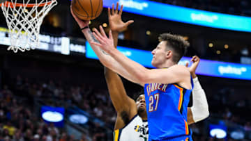 Vit Krejci #27 of the Oklahoma City Thunder shoots over Hassan Whiteside #21 of the Utah Jazz during the second half of a game at Vivint Smart Home Arena on April 06, 2022 in Salt Lake City, Utah. (Photo by Alex Goodlett/Getty Images)