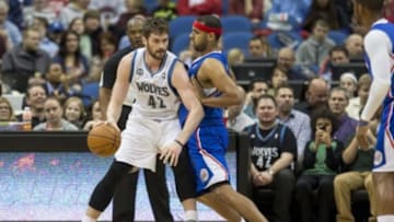 Mar 31, 2014; Minneapolis, MN, USA; Minnesota Timberwolves forward Kevin Love (42) attempts to get around Los Angeles Clippers forward Jared Dudley (9) in the first half at Target Center. Mandatory Credit: Jesse Johnson-USA TODAY Sports