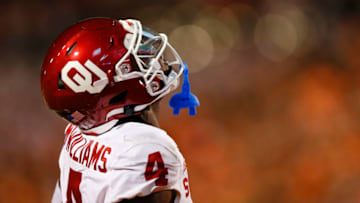 STILLWATER, OK - NOVEMBER 27: Wide receiver Mario Williams #4 of the Oklahoma Sooners reacts after making a catch out of bounds from the end zone in the final minute against of the Oklahoma State Cowboys at Boone Pickens Stadium on November 27, 2021 in Stillwater, Oklahoma. The Cowboys won 37-33. (Photo by Brian Bahr/Getty Images)