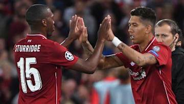 TOPSHOT - Liverpool's Brazilian midfielder Roberto Firmino (R) replaces Liverpool's English striker Daniel Sturridge during the UEFA Champions League group C football match between Liverpool and Paris Saint-Germain at Anfield in Liverpool, north west England on September 18, 2018. (Photo by Paul ELLIS / AFP) (Photo credit should read PAUL ELLIS/AFP/Getty Images)