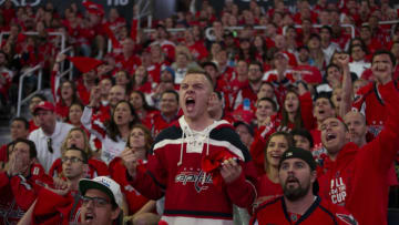 WASHINGTON, DC - JUNE 07: A Washington Capitals fans cheer during the fan watch party at Capitol One Area on June 7, 2018 in Washington, DC. The Washington Capitals head into Game 5 tonight against the Las Vegas Golden Knights with a 3-1 series lead. (Photo by Alex Edelman/Getty Images)