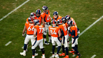 DENVER, CO - DECEMBER 29: The Denver Broncos huddle against the Oakland Raiders during the third quarter at Empower Field at Mile High on December 29, 2019 in Denver, Colorado. The Broncos defeated the Raiders 16-15. (Photo by Justin Edmonds/Getty Images)