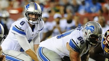 Aug 20, 2015; Landover, MD, USA; Detroit Lions quarterback Dan Orlovsky (8) prepares for the snap from center Braxston Cave (60) against the Washington Redskins during the second half at FedEx Field. The Washington Redskins won 21 - 17, Mandatory Credit: Brad Mills-USA TODAY Sports