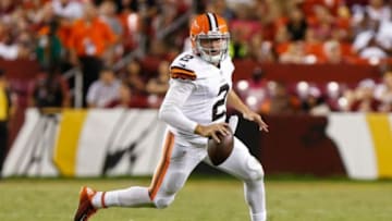 Aug 18, 2014; Landover, MD, USA; Cleveland Browns quarterback Johnny Manziel (2) runs with the ball against the Washington Redskins at FedEx Field. Mandatory Credit: Geoff Burke-USA TODAY Sports
