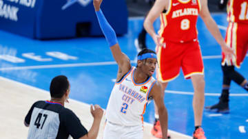 OKC Thunder guard Shai Gilgeous-Alexander (2) reacts after making a three point basket against the Atlanta Hawks. Mandatory Credit: Alonzo Adams-USA TODAY Sports.