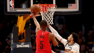DENVER, COLORADO - MAY 01: Rodney Hood #5 of the Portland Trail Blazers goes to the basket against Jamal Murray #27 of the Denver Nuggets in the second quarter during Game Two of the Western Conference Semi-Finals of the 2019 NBA Playoffs at the Pepsi Center on May 1, 2019 in Denver, Colorado. NOTE TO USER: User expressly acknowledges and agrees that, by downloading and or using this photograph, User is consenting to the terms and conditions of the Getty Images License Agreement. (Photo by Matthew Stockman/Getty Images)