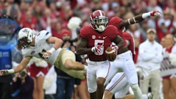 Nov 21, 2015; Tuscaloosa, AL, USA; Alabama Crimson Tide defensive back Cyrus Jones (5) returns a punt for a touchdown against Charleston Southern Buccaneers at Bryant-Denny Stadium. Mandatory Credit: Marvin Gentry-USA TODAY Sports