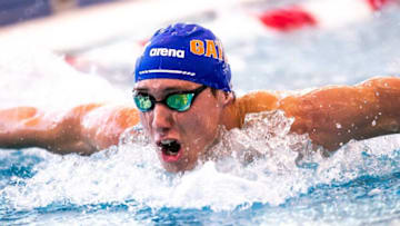 Florida swimmer Eric Brown competes in the 200 Fly at the The Florida Aquatics Swimming & Training (FAST) which hosted the Sunshine Showdown featuring UF vs. FSU Men and Women’s Swim Meet on Friday, January 20, 2023 in Ocala, FL. Teams competed in 16 events including the 100s and 200s of each stroke in addition to 50, 500, 1650 free, and 400 IM. The meet will start off with the 200 medley relay and finish with the 200 free relay. Florida holds the advantage in both series, 59-24-1 for the men, dating back to 1956, and 46-3 for the women. [Doug Engle/Ocala Star Banner]2023Gai Sunshineshowdown