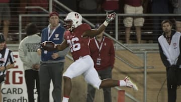 October 3, 2015; Stanford, CA, USA; Stanford Cardinal running back Barry Sanders (26) scores a touchdown against the Arizona Wildcats during the third quarter at Stanford Stadium. Stanford defeated Arizona 55-17. Mandatory Credit: Kyle Terada-USA TODAY Sports