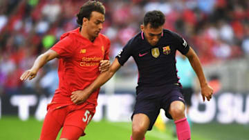 LONDON, ENGLAND - AUGUST 06: Munir El Haddabi of Barcelona is closed down by Lazar Markovic of Liverpool during the International Champions Cup match between Liverpool and Barcelona at Wembley Stadium on August 6, 2016 in London, England. (Photo by Michael Regan/Getty Images)