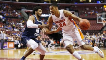 SUNRISE, FLORIDA - DECEMBER 21: Kerry Blackshear Jr. #24 of the Florida Gators drives to the basket against Alphonso Anderson #10 of the Utah State Aggies during the second half of the Orange Bowl Basketball Classic at BB&T Center on December 21, 2019 in Sunrise, Florida. (Photo by Michael Reaves/Getty Images)