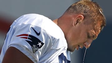 Jul 30, 2016; Foxborough, MA, USA; Water drips from the face of New England Patriots tight end Rob Gronkowski (87) during training camp at Gillette Stadium. Mandatory Credit: Winslow Townson-USA TODAY Sports