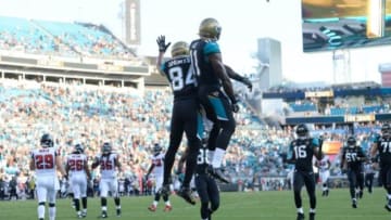 Aug 28, 2014; Jacksonville, FL, USA; Jacksonville Jaguars wide receiver Marqise Lee (11) celebrates his touchdown reception against the Atlanta Falcons with teammate Cecil Shorts III (84) during the 2nd quarter at EverBank Field. Mandatory Credit: Richard Dole-USA TODAY Sports