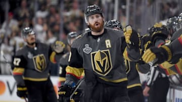 LAS VEGAS, NV - MAY 30: James Neal #18 of the Vegas Golden Knights is congratulated by his teammates at the bench after scoring a first-period goal against the Washington Capitals in Game Two of the 2018 NHL Stanley Cup Final at T-Mobile Arena on May 30, 2018 in Las Vegas, Nevada. (Photo by Harry How/Getty Images)