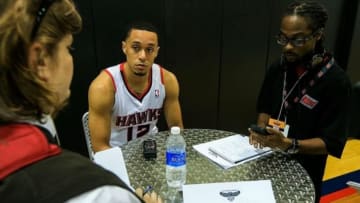 Sep 30, 2013; Atlanta, GA, USA; Atlanta Hawks shooting guard John Jenkins (12) is interviewed during media day at Philips Arena. Mandatory Credit: Daniel Shirey-USA TODAY Sports