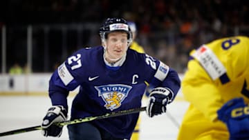 MONCTON, NB - JANUARY 02: Oliver Kapanen #27 of Team Finland skates for the puck against Team Sweden in the second period of a Quarterfinal game during the 2023 IIHF World Junior Championship at Avenir Centre on January 2, 2023 in Moncton, Canada. (Photo by Dale Preston/Getty Images)
