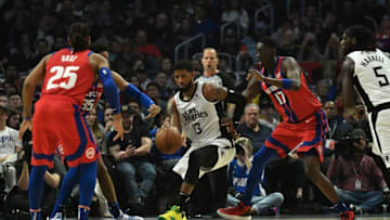 LOS ANGELES, CA - JANUARY 02: Paul George #13 of the Los Angeles Clippers is pressured by Tony Snell #17 of the Detroit Pistons during the first half at Staples Center on January 2, 2020 in Los Angeles, California. NOTE TO USER: User expressly acknowledges and agrees that, by downloading and or using this Photograph, user is consenting to the terms and conditions of the Getty Images License Agreement.(Photo by Kevork Djansezian/Getty Images)