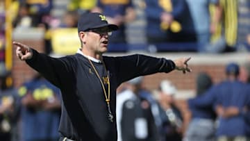 ANN ARBOR, MI - SEPTEMBER 9: University of Michigan coach Jim Harbaugh watches the warm-up prior to the start of the game against the Cincinnati Bearcats at Michigan Stadium on September 9, 2017 in Ann Arbor, Michigan.(Photo by Leon Halip/Getty Images)