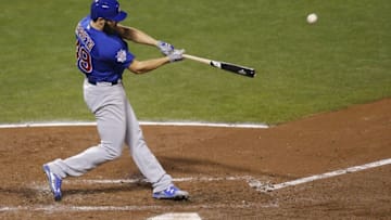 Oct 10, 2016; San Francisco, CA, USA; Chicago Cubs starting pitcher Jake Arrieta (49) hits a three run home run against the San Francisco Giants during the second inning in game three of the 2016 NLDS playoff baseball series at AT&T Park. Mandatory Credit: John Hefti-USA TODAY Sports