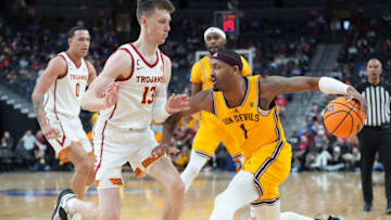 Mar 9, 2023; Las Vegas, NV, USA; Arizona State Sun Devils guard Luther Muhammad (1) dribbles against USC Trojans guard Drew Peterson (13) during the first half at T-Mobile Arena. Mandatory Credit: Stephen R. Sylvanie-USA TODAY Sports
