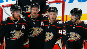 ANAHEIM, CA - DECEMBER 6: Cam Fowler #4, Corey Perry #10, Josh Manson #42, and Adam Henrique #14 of the Anaheim Ducks wait for a face-off during the game against the Ottawa Senators on December 6, 2017 at Honda Center in Anaheim, California. (Photo by Debora Robinson/NHLI via Getty Images)