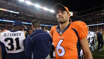 Aug 27, 2016; Denver, CO, USA; Denver Broncos quarterback Mark Sanchez (6) leaves the field following the win over the Los Angeles Rams at Sports Authority Field at Mile High. The Broncos defeated the Rams 17-9. Mandatory Credit: Ron Chenoy-USA TODAY Sports