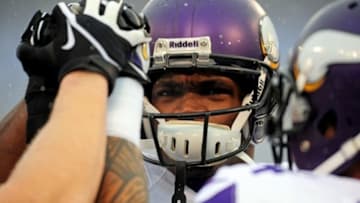 Dec 8, 2013; Baltimore, MD, USA; Minnesota Vikings running back Adrian Peterson (28) huddles with teammates prior to the game against the Baltimore Ravens at M