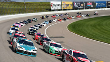 KANSAS CITY, KANSAS - OCTOBER 19: Christopher Bell, driver of the #20 Rheem Toyota, and Brandon Jones, driver of the #19 Flow Toyota, lead the field to the green flag to start the NASCAR Xfinity Series Kansas Lottery 300 at Kansas Speedway on October 19, 2019 in Kansas City, Kansas. (Photo by Jared C. Tilton/Getty Images)
