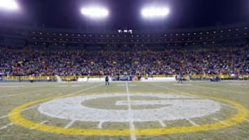 Nov 30, 2014; Green Bay, WI, USA; The Green Bay Packers logo at midfield of Lambeau Field following the game between the New England Patriots and Green Bay Packers. Green Bay won 26-21. Mandatory Credit: Jeff Hanisch-USA TODAY Sports